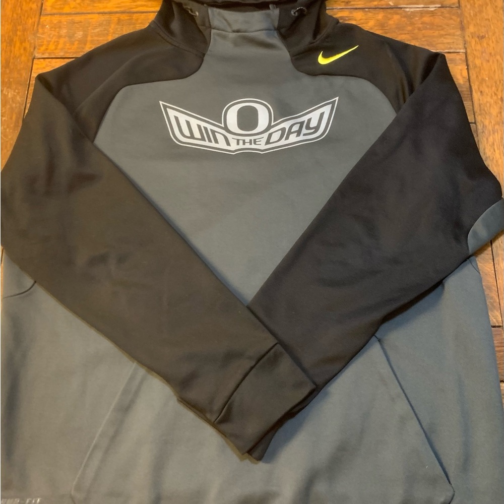 Nike Therma-Fit Oregon Ducks "Win The Day" pullover hoodie.